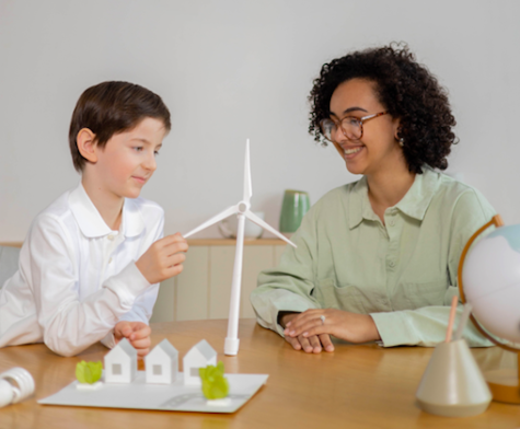 Kind lernt &uuml;ber Windkraft