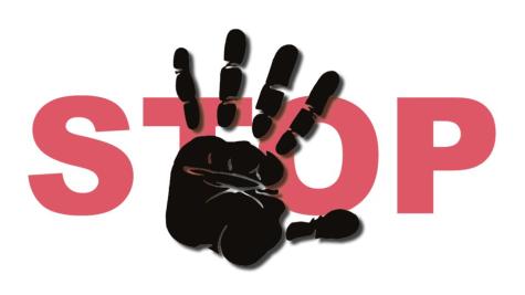 Hand vor SCHRIFT STOP