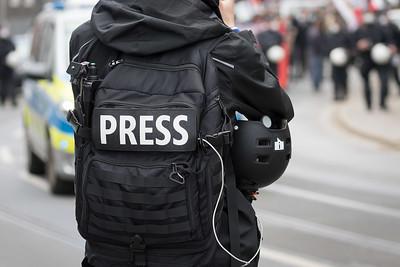 Ein Pressevertreter auf einer Demo