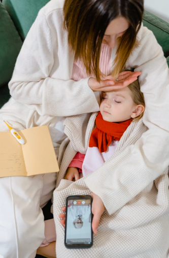 Mutter mit krankem Kind